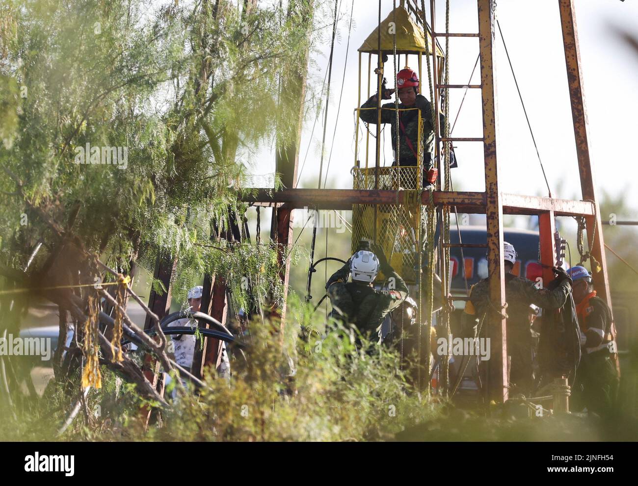 Rescue personnel participate in the rescue operation for miners trapped in a coal mine that collapsed in Sabinas, Coahuila state, Mexico August 11, 2022. REUTERS/Luis Cortes Stock Photo