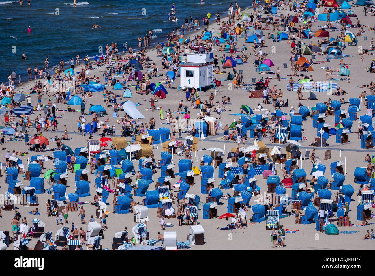Rostock, Germany. 11th Aug, 2022. Tourists and day visitors take