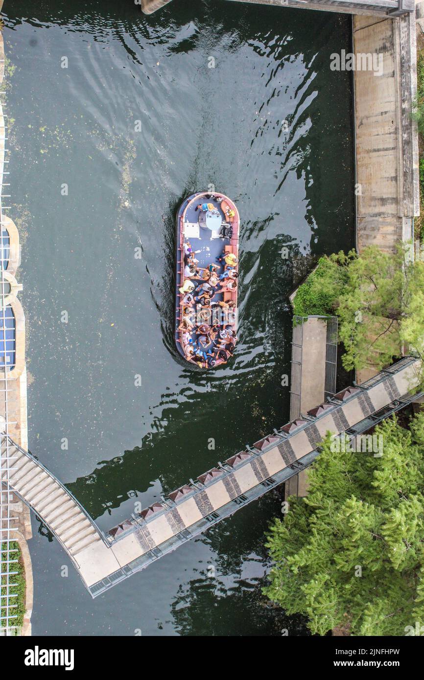 Boat tour looking down from a balcony along the San Antonio Texas Riverwalk Stock Photo