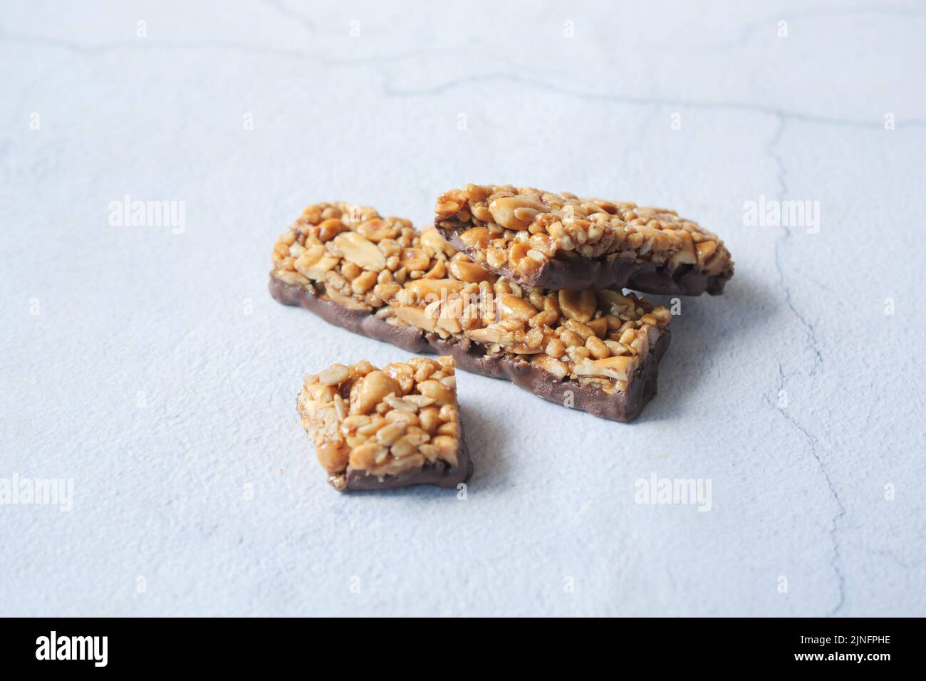 chocolate oat protein bars on table . Stock Photo