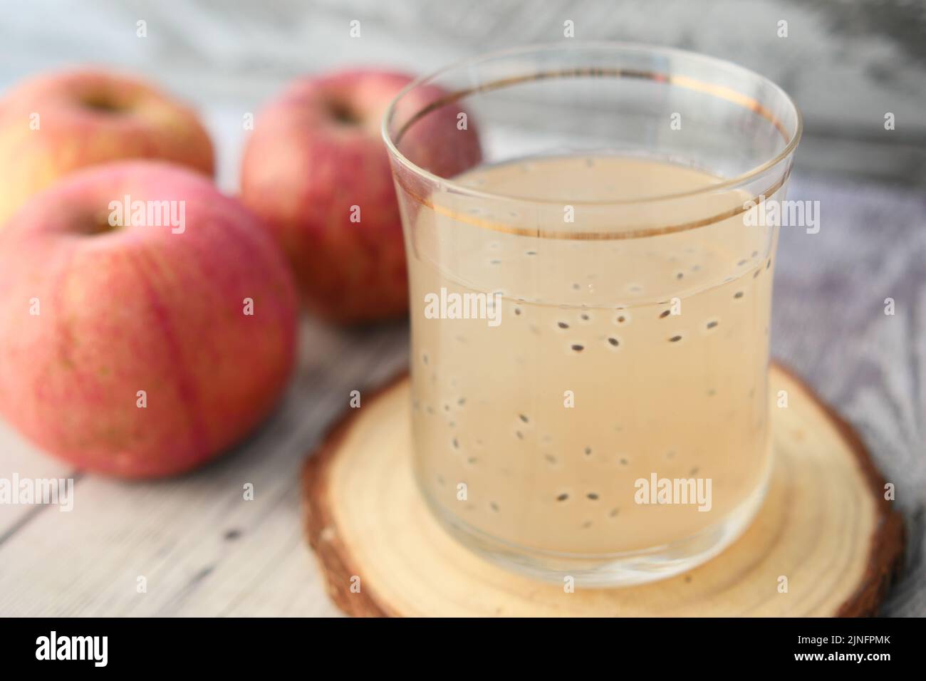 seed apple juice in a glass on table  Stock Photo