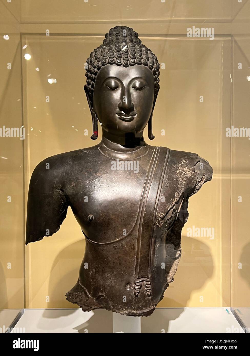 Head and Torso of a Buddha; Bronze, 14th to 15th century, Thailand, Sukhothai Period. Brooklyn Museum. Stock Photo