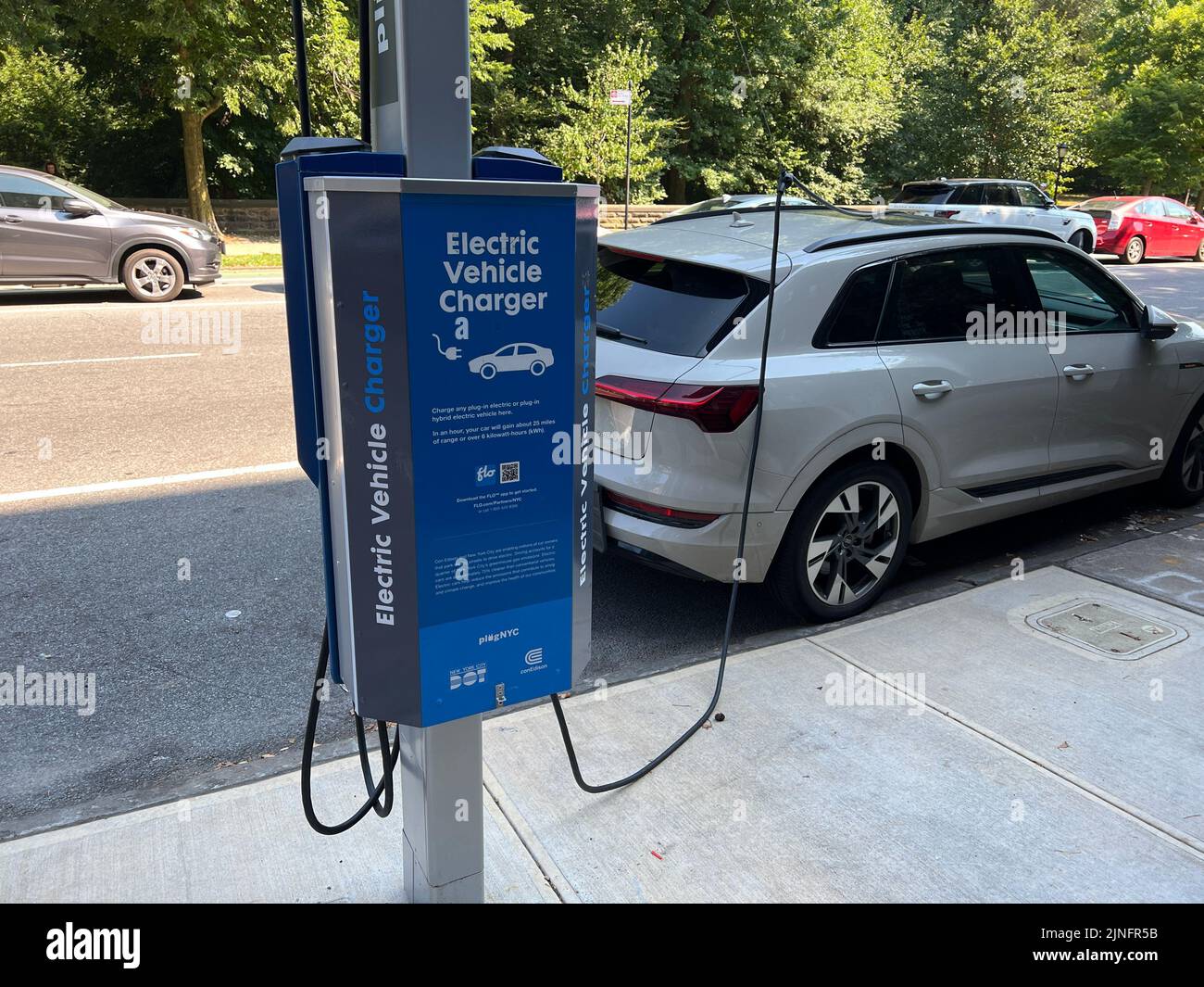 Electric car charging station on a street in Park Slope, Brooklyn, New York. Stock Photo