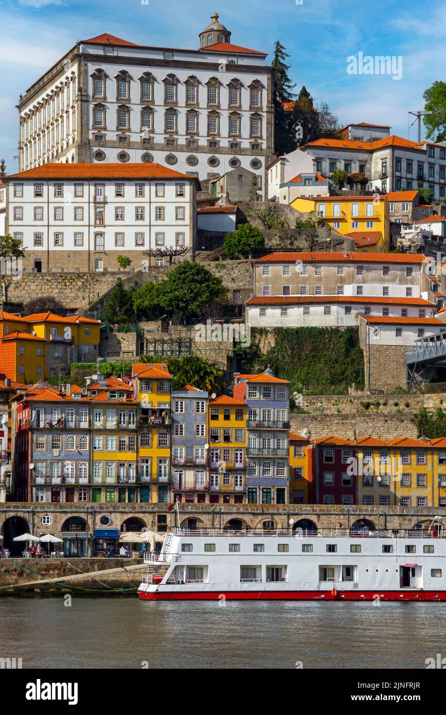 Tourist boat sailing on the River Douro in the centre of Porto a major city in northern Portugal. Stock Photo