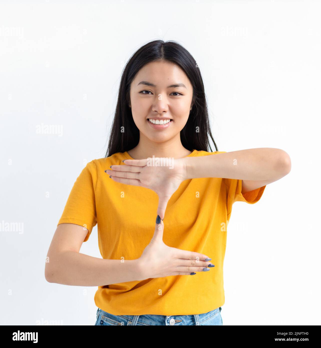 Deaf mute young Asian woman white background Stock Photo