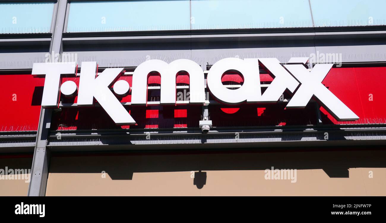 An exterior sign or signage or logo on the T K Max shop or store in central Manchester, United Kingdom, British Isles. Stock Photo