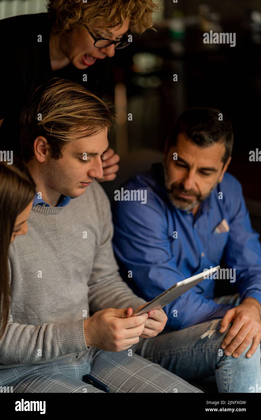 Four amazing business people are having a discission Stock Photo - Alamy