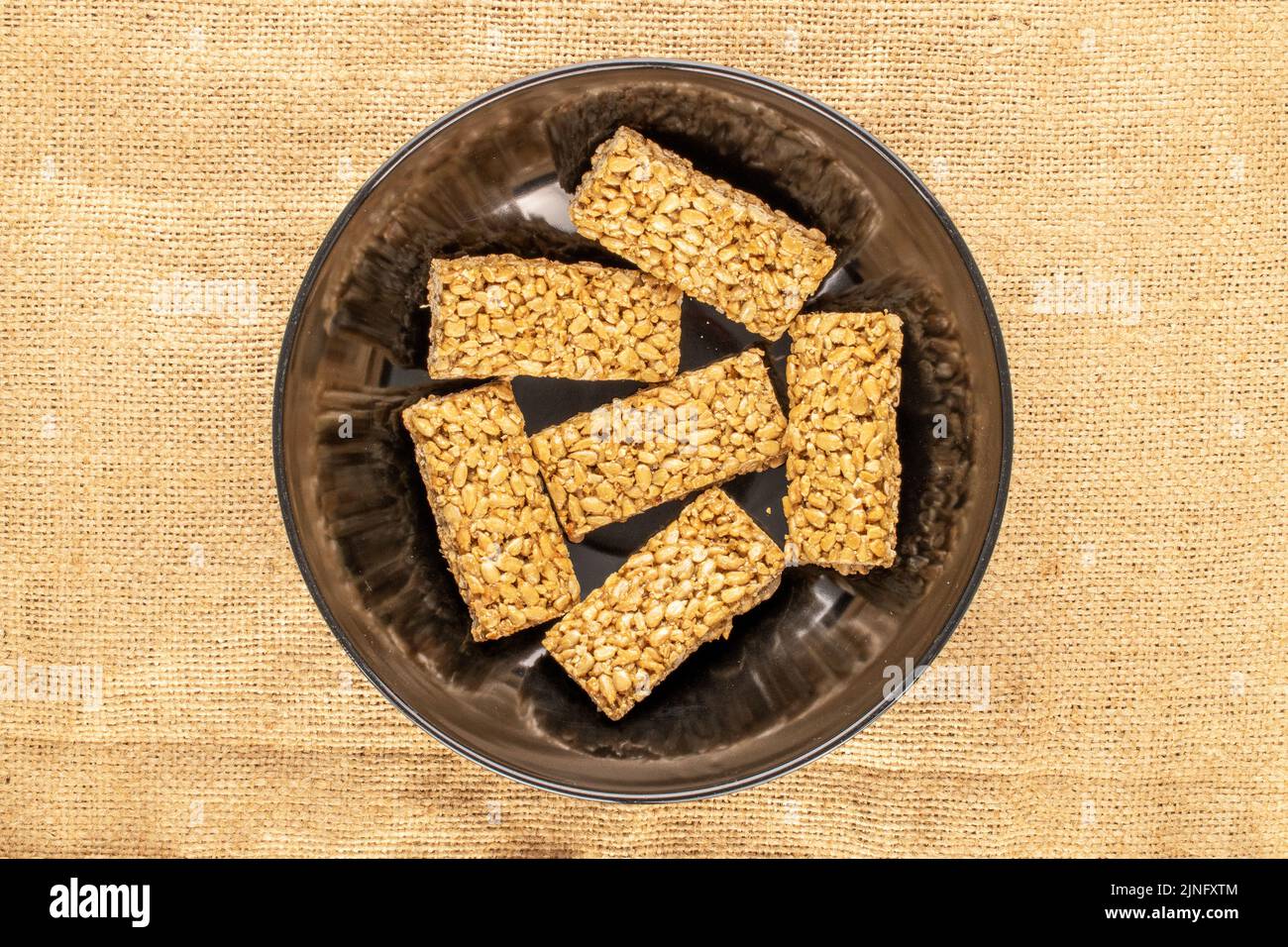 Several sweet candies Grillage from sunflower seeds and honey in a