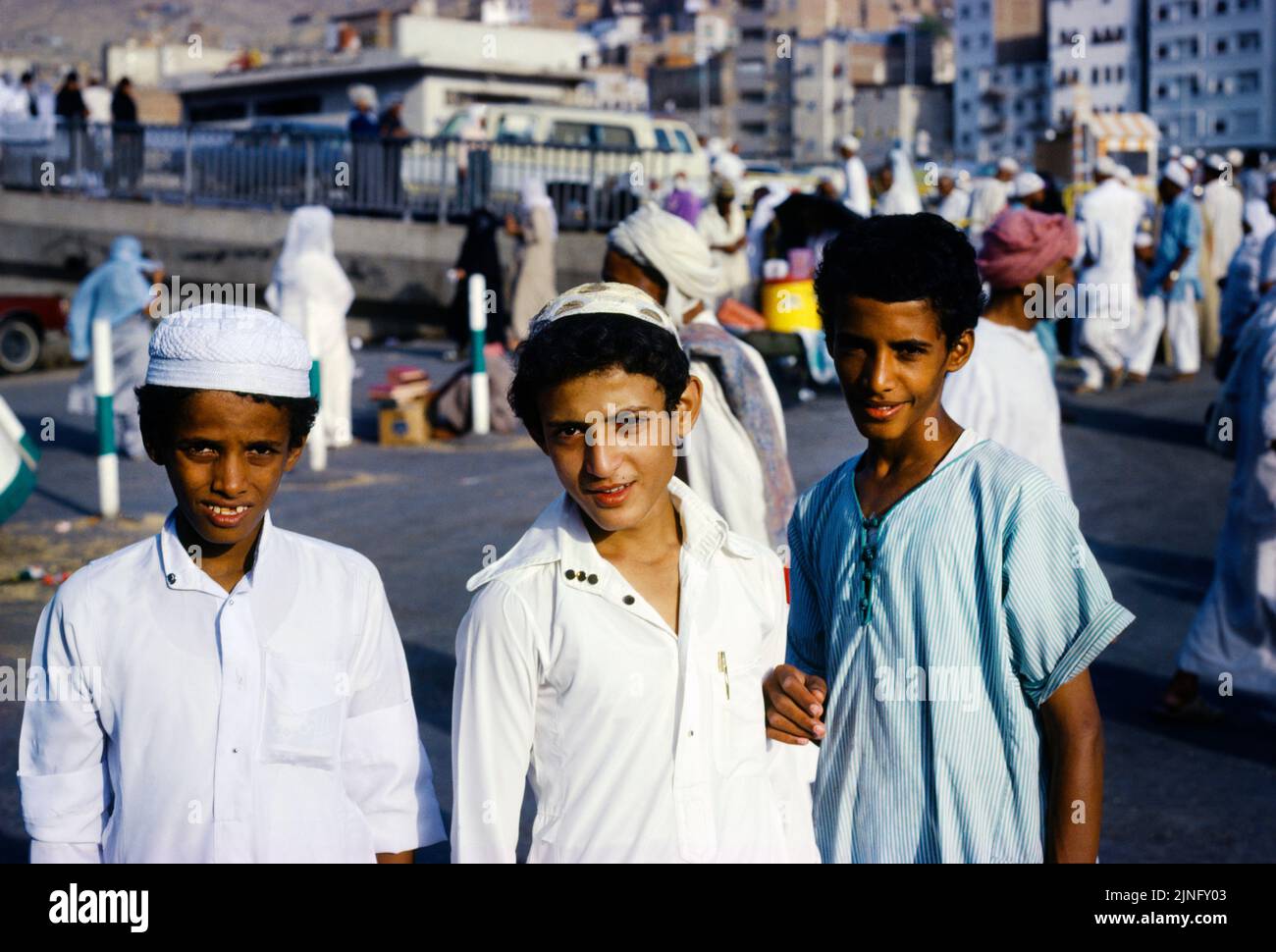 Makkah Hajj Saudi Arabia Young Teenage Boys Pilgrims wearing Ihram Clothing Stock Photo