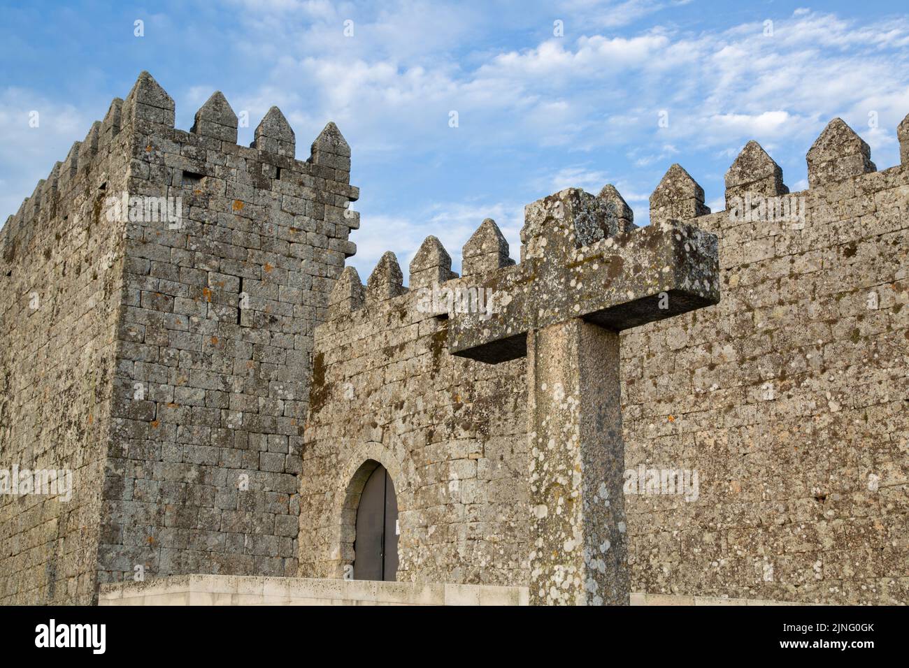 Castle Facade and Cross, Trancoso, Portugal Stock Photo