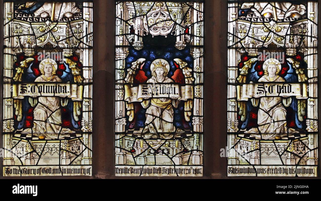 Stained glass window by Percy Bacon & Brothers depicting English Saints, Oswal, Columba & Chad; St Oswald's Church, Ashbourne, Derbyshire Stock Photo