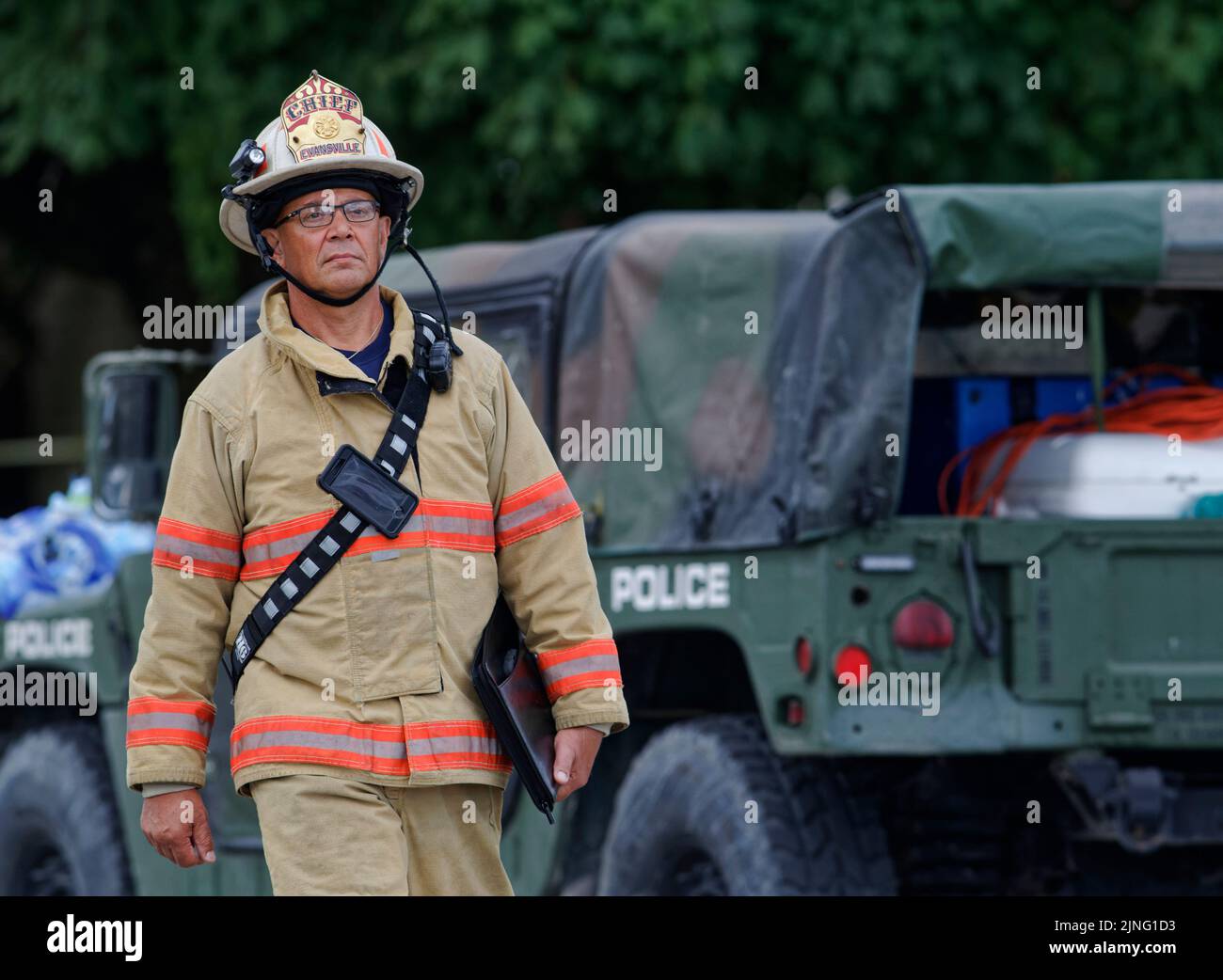 Evansville, Indiana, USA. 11 Aug 2022. Evansville Fire Department Chief Mike Connelly walks away from the area where a house exploded the previous day. Local, state and federal authorities are investigating the explosion, which killed at least three people and damaged 39 homes in the area, leaving 11 uninhabitable. (Credit: Billy Suratt/Apex MediaWire via Alamy Live News) Stock Photo