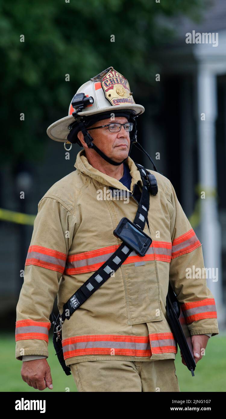 Evansville, Indiana, USA. 11 Aug 2022. Evansville Fire Department Chief Mike Connelly walks away from the area where a house exploded the previous day. Local, state and federal authorities are investigating the explosion, which killed at least three people and damaged 39 homes in the area, leaving 11 uninhabitable. (Credit: Billy Suratt/Apex MediaWire via Alamy Live News) Stock Photo
