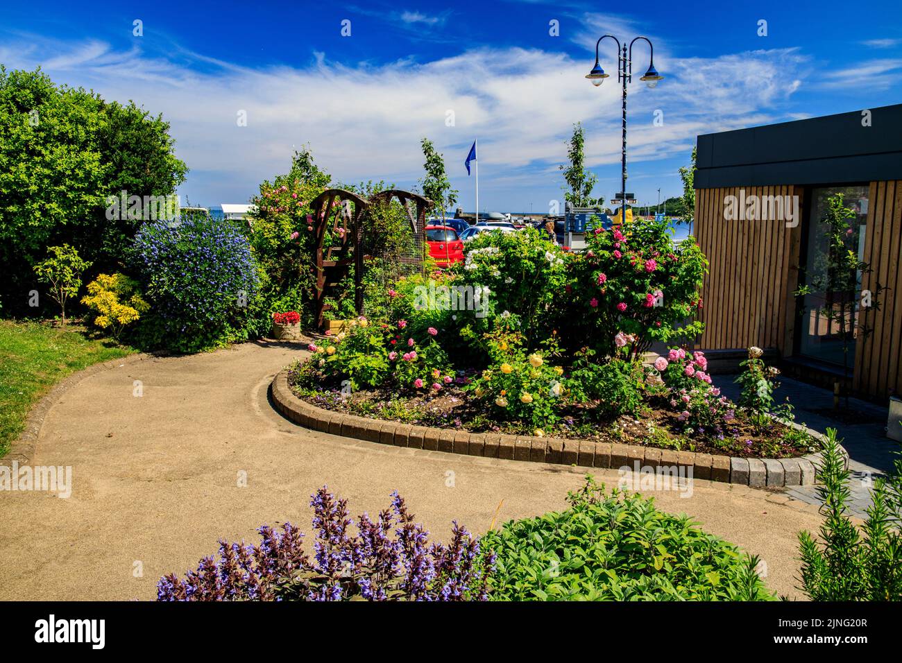 Saundersfoot has a sensory garden filled with colourful, tactile or perfumed plants in front of the Hean castle hotel, Pembrokeshire, Wales, UK Stock Photo