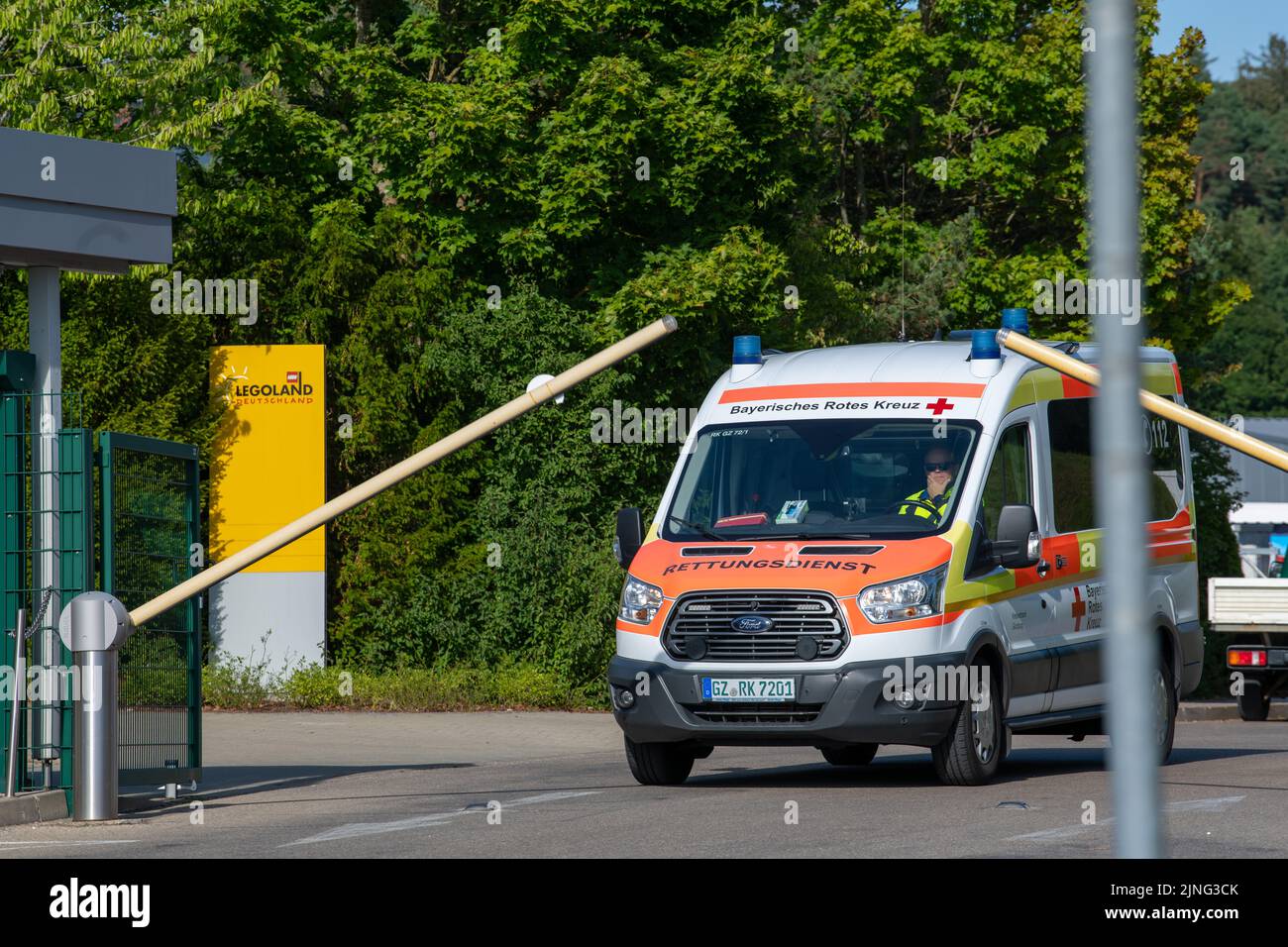11 August 2022, Bavaria, Günzburg An ambulance drives past the