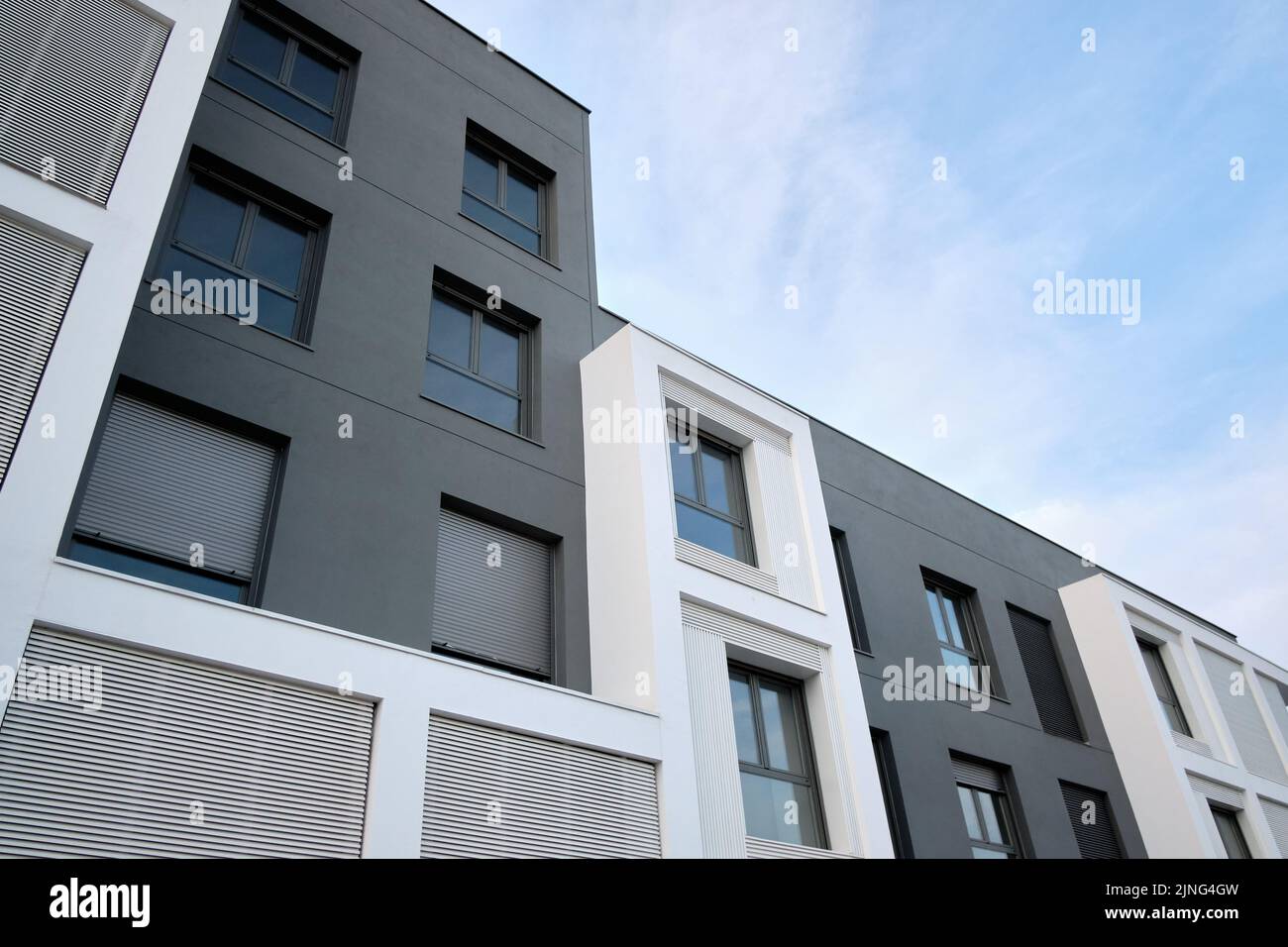 Modern residential apartment block with exterior flat buildings. Detail of the new luxury house and residential complex. Stock Photo