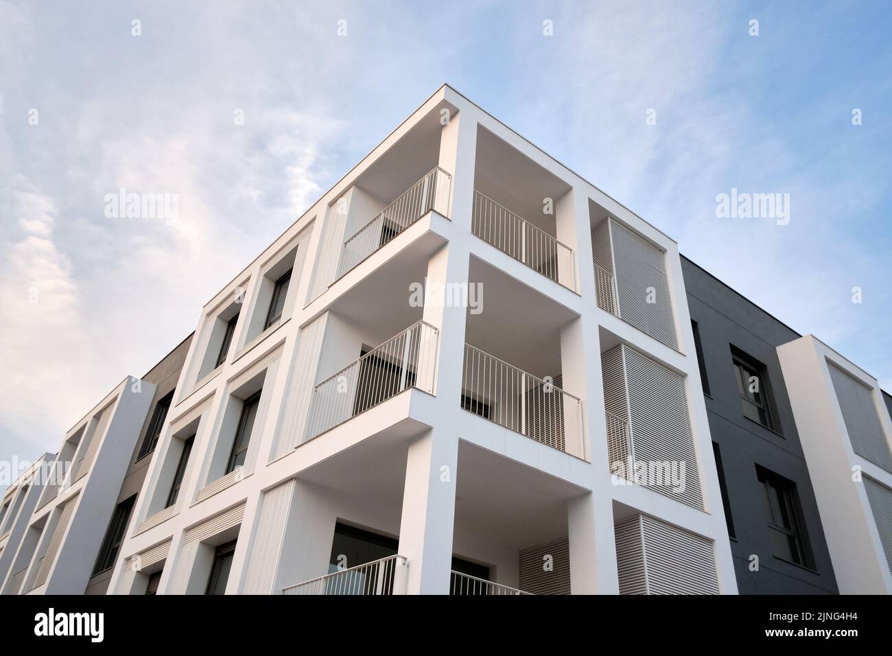 Modern residential apartment block with exterior flat buildings. Detail of the new luxury house and residential complex. Stock Photo