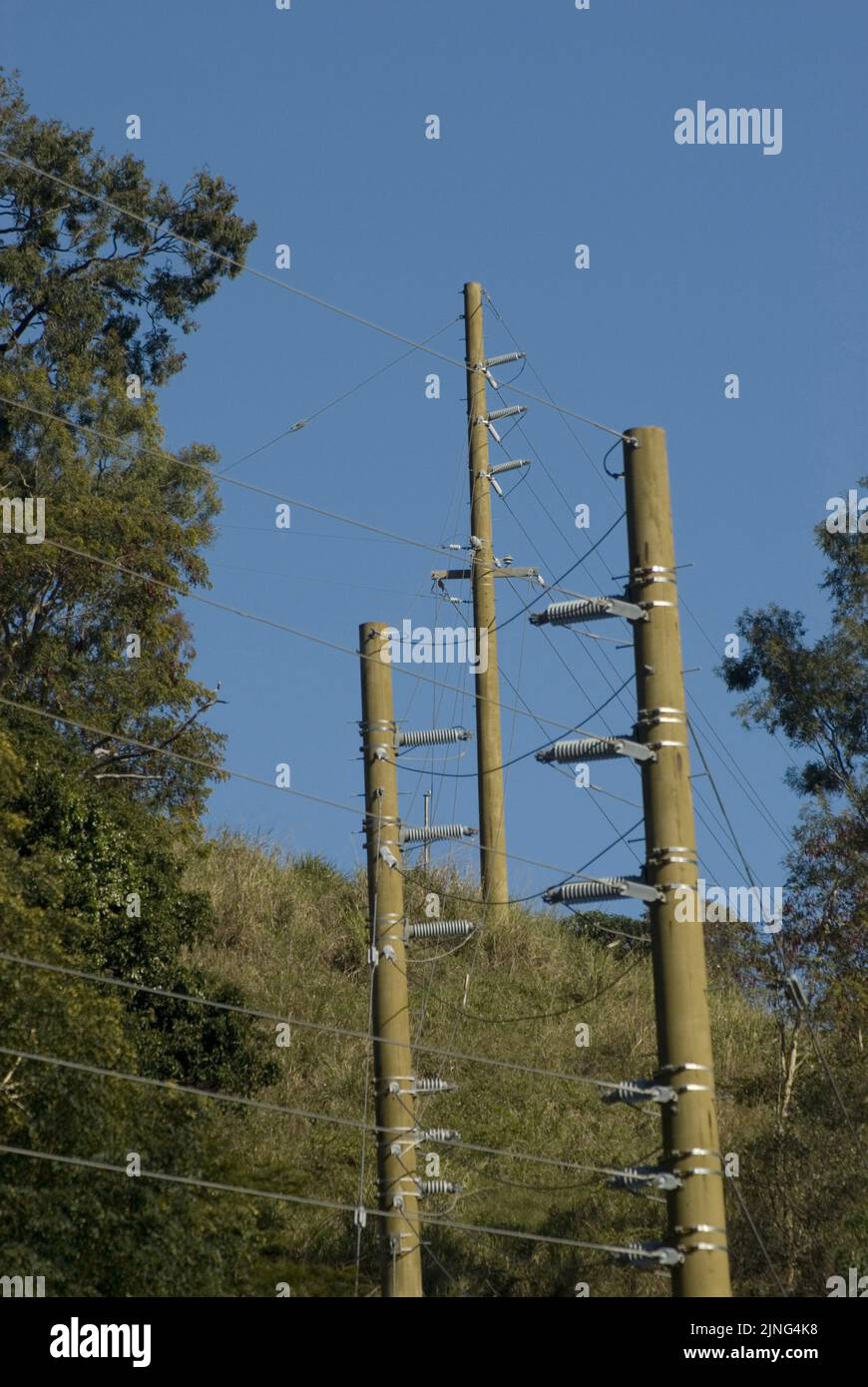 a lines of electric power cables distributing energy to a small town Stock Photo Alamy