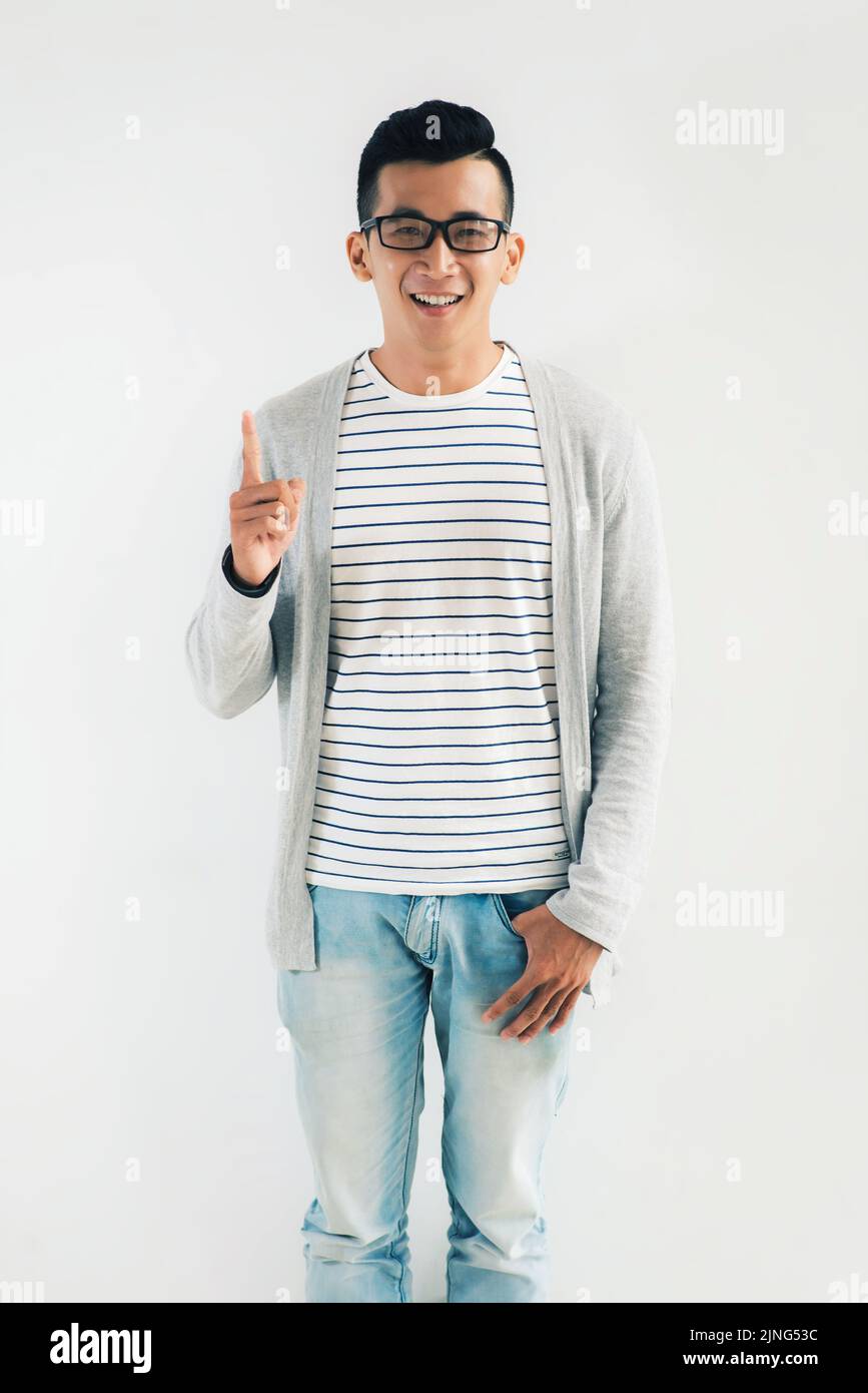 Smiling mixedrace young man having an idea Stock Photo Alamy