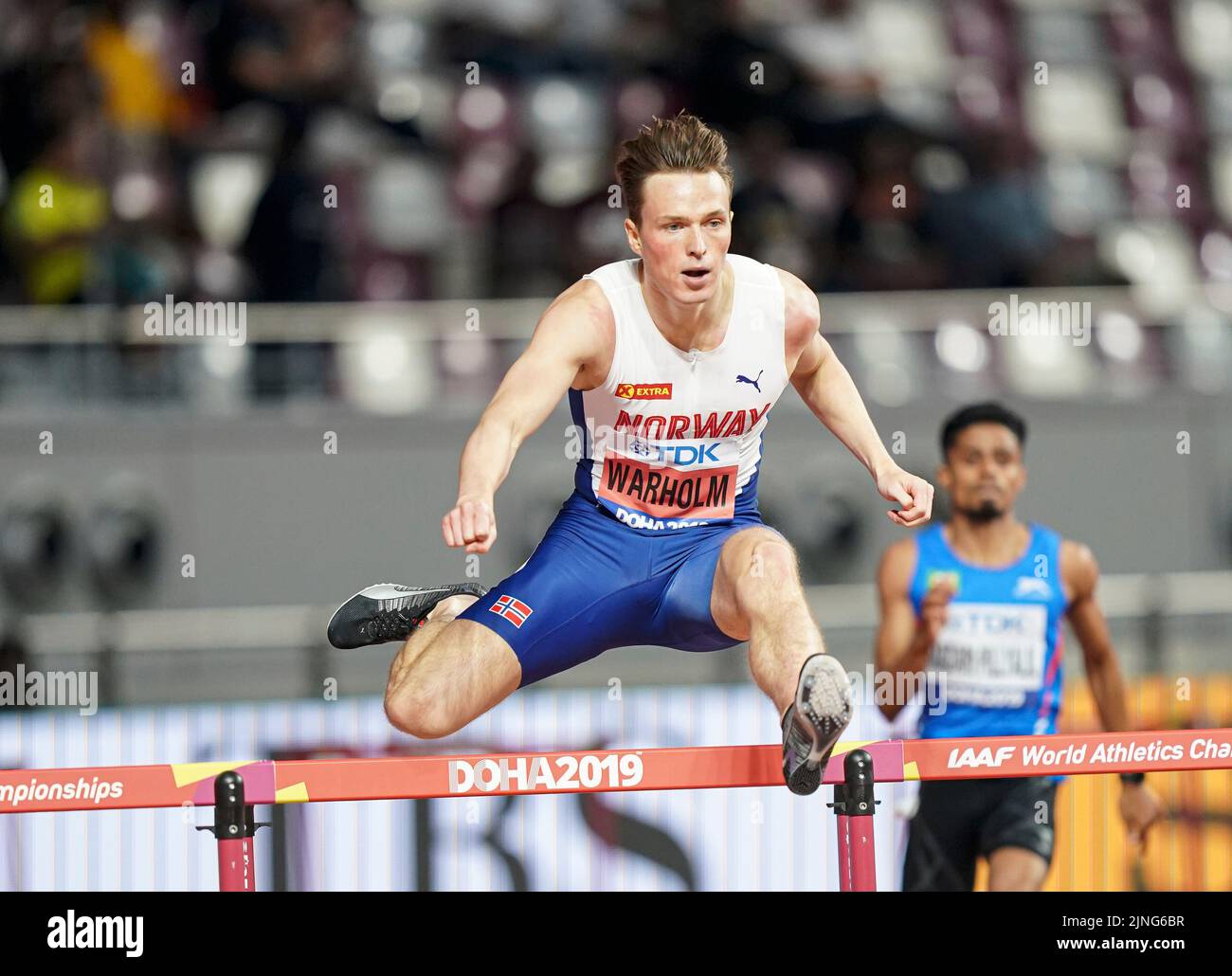 Karsten Warholm participating in the 400m hurdles at the Doha 2019