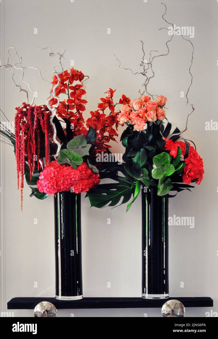 Flowers at home, Flowers   Design, floral arrangement of roses, orchids and petunias. Stock Photo