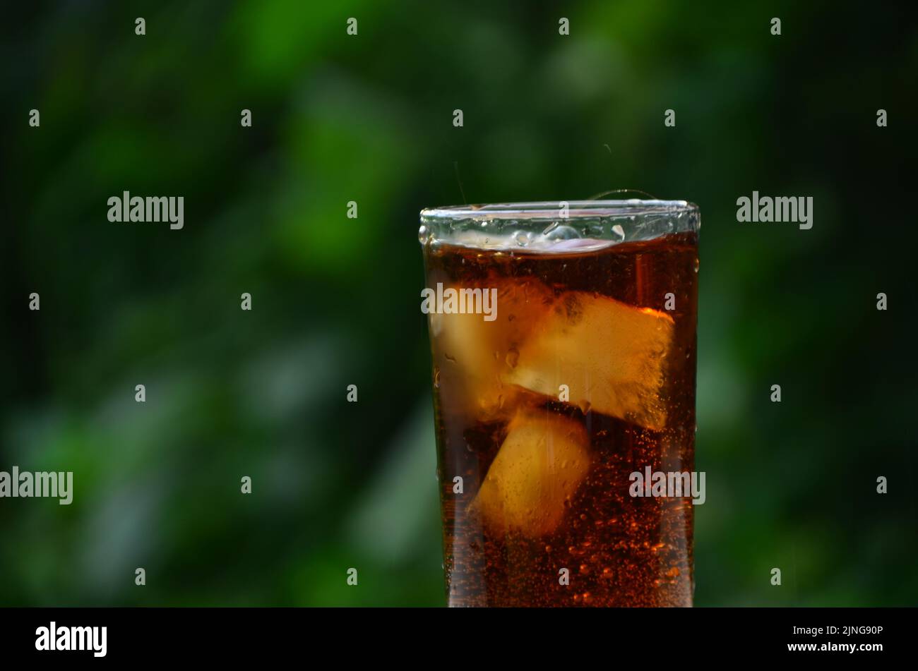 Fizz sparkling Cola water Refreshing bubbly Soda Pop with Ice Cubes