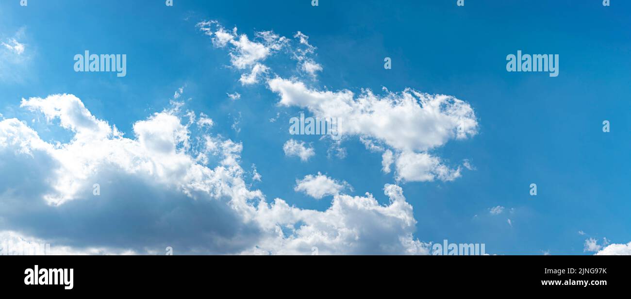 Panoramic of white clouds against blue sky, perfect background for website, banner and others Stock Photo