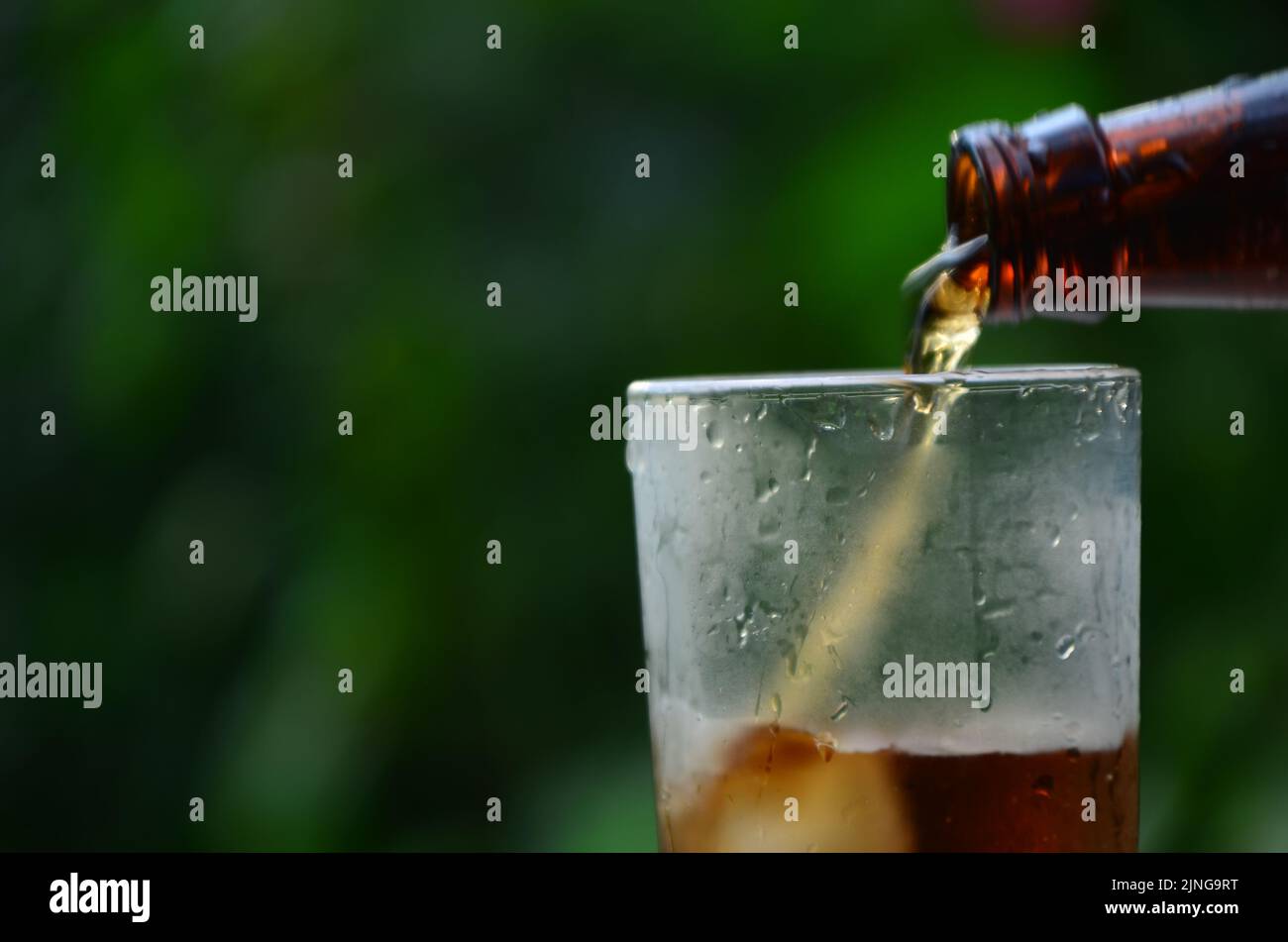 Fizz sparkling Cola water Refreshing bubbly Soda Pop with Ice Cubes