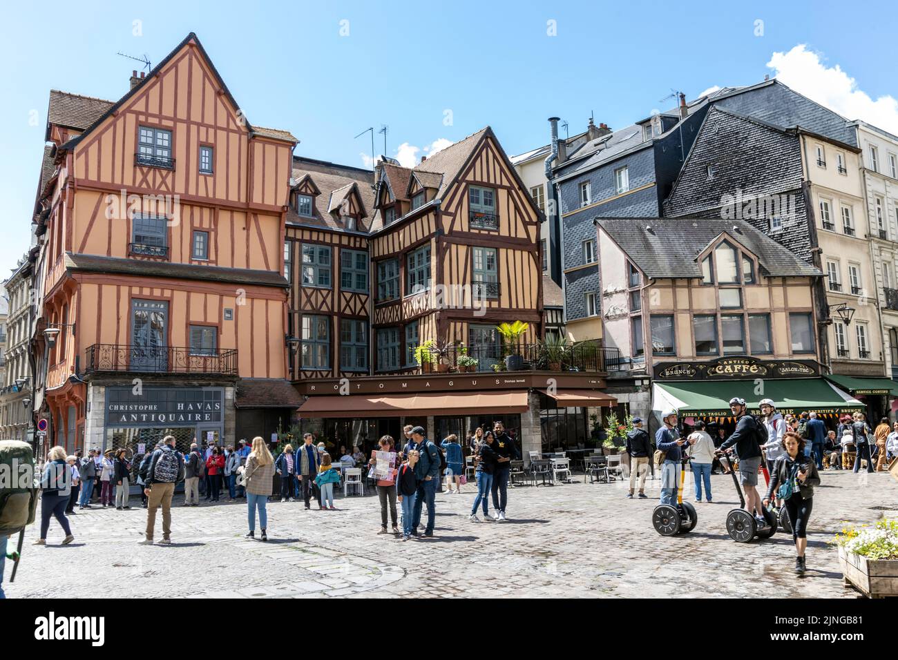 Tourists exploring Rouen's medieval old town in Normandy France Stock Photo