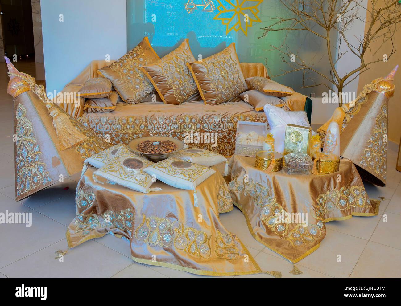 Moroccan wedding gifts with the Moroccan wedding sofa on which the groom and the bride sit Stock Photo