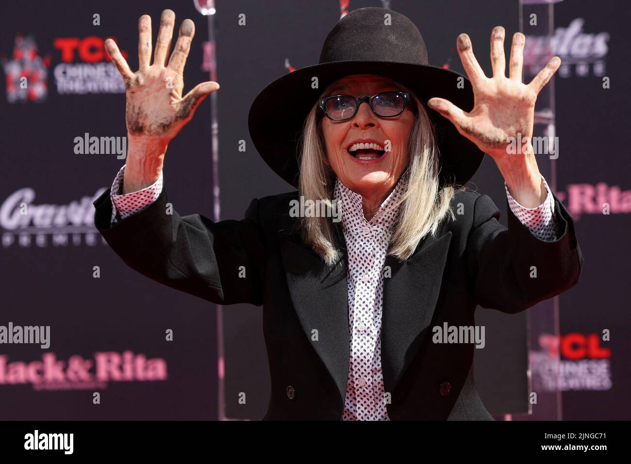 Actor Diane Keaton shows her hands after placing them on fresh cement during a ceremony TCL Chinese theatre in Los Angeles, California, U.S., August 11, 2022. REUTERS/Mario Anzuoni Stock Photo