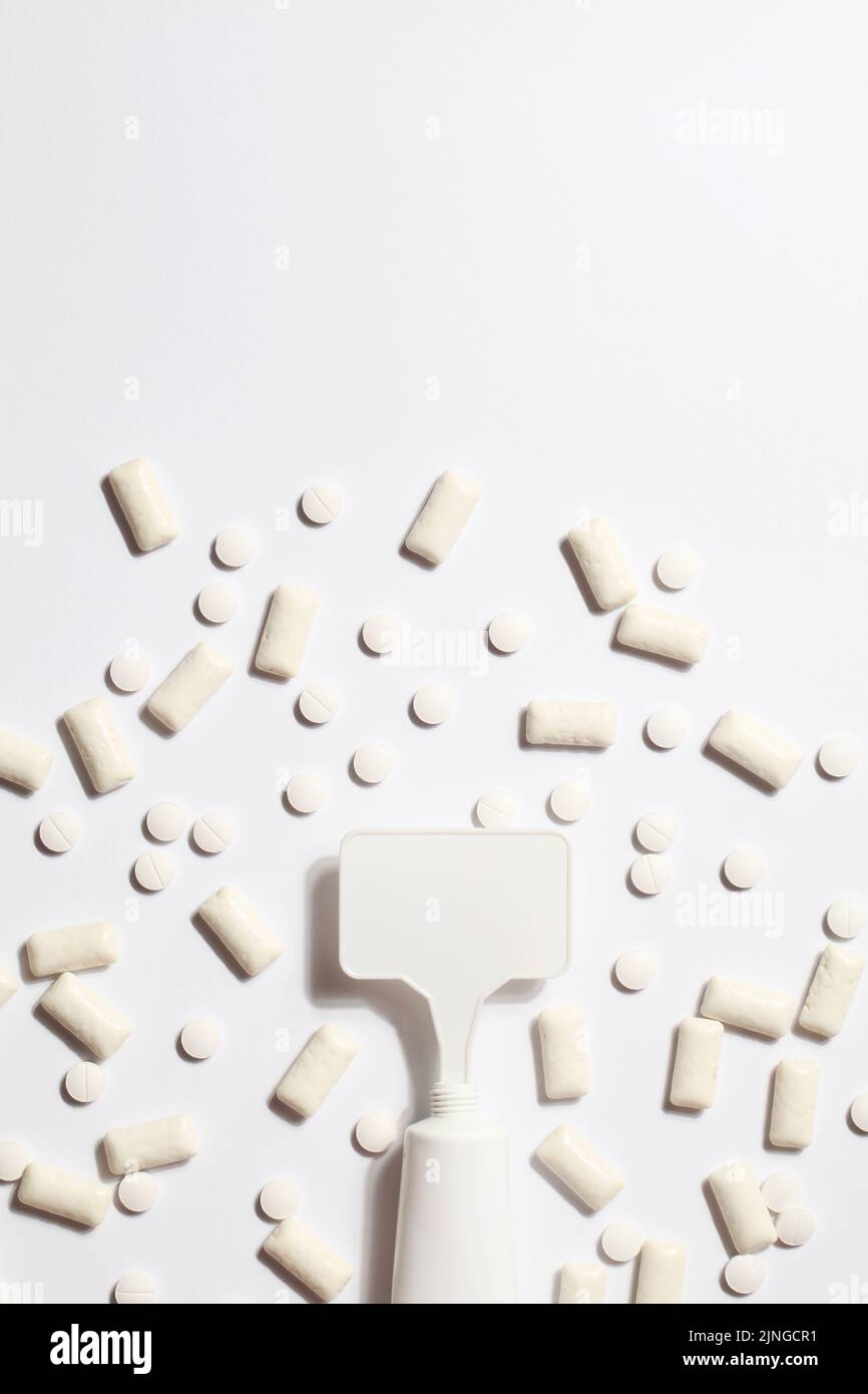 Titanium dioxide, E171, dangerous additive concept. gum, pills