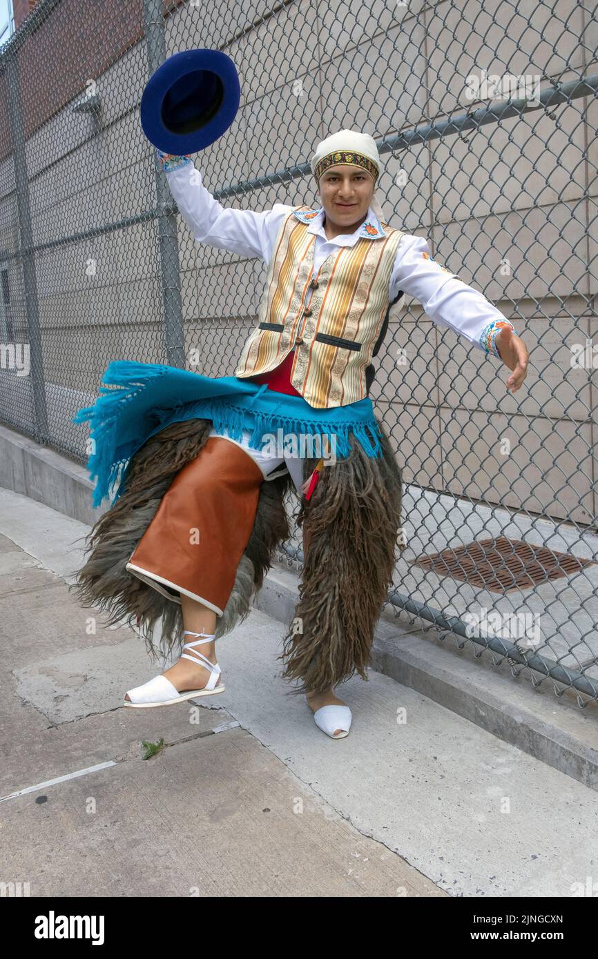 Posed portrait of a member of Jatary Muzhucuna, an Ecuadorian American music & dance troupe. At the Ecuadorian Parade NYC 2022 in Queens, New York. Stock Photo