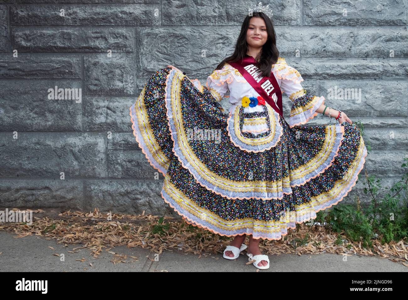 A pretty teen beauty queen just prior to the Ecuadorian Parade NYC 2022 in Jackson Heights, Queens, New York. Stock Photo