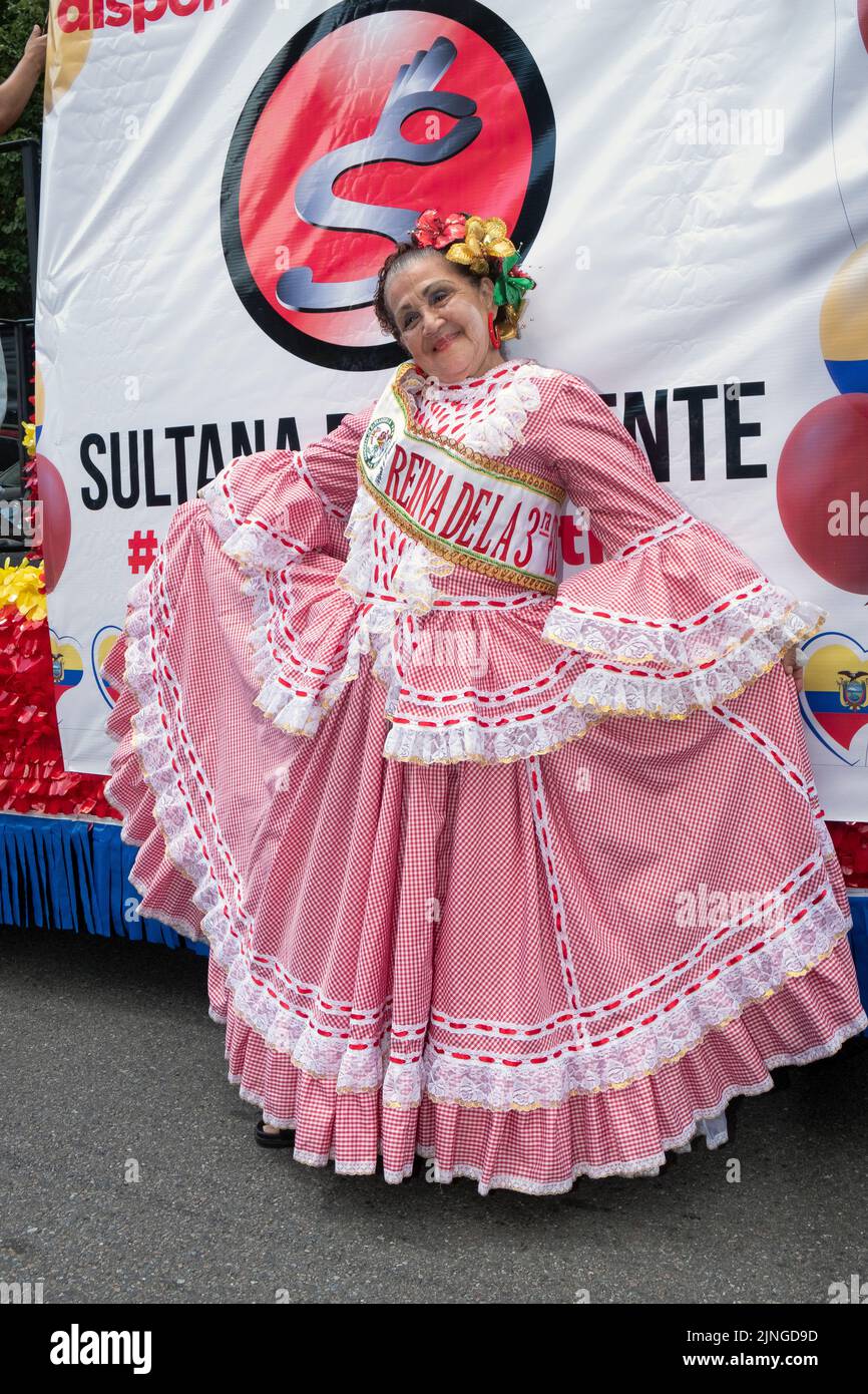 A senior beauty queen wearing a sash from Carnaval de Barranquilla. At