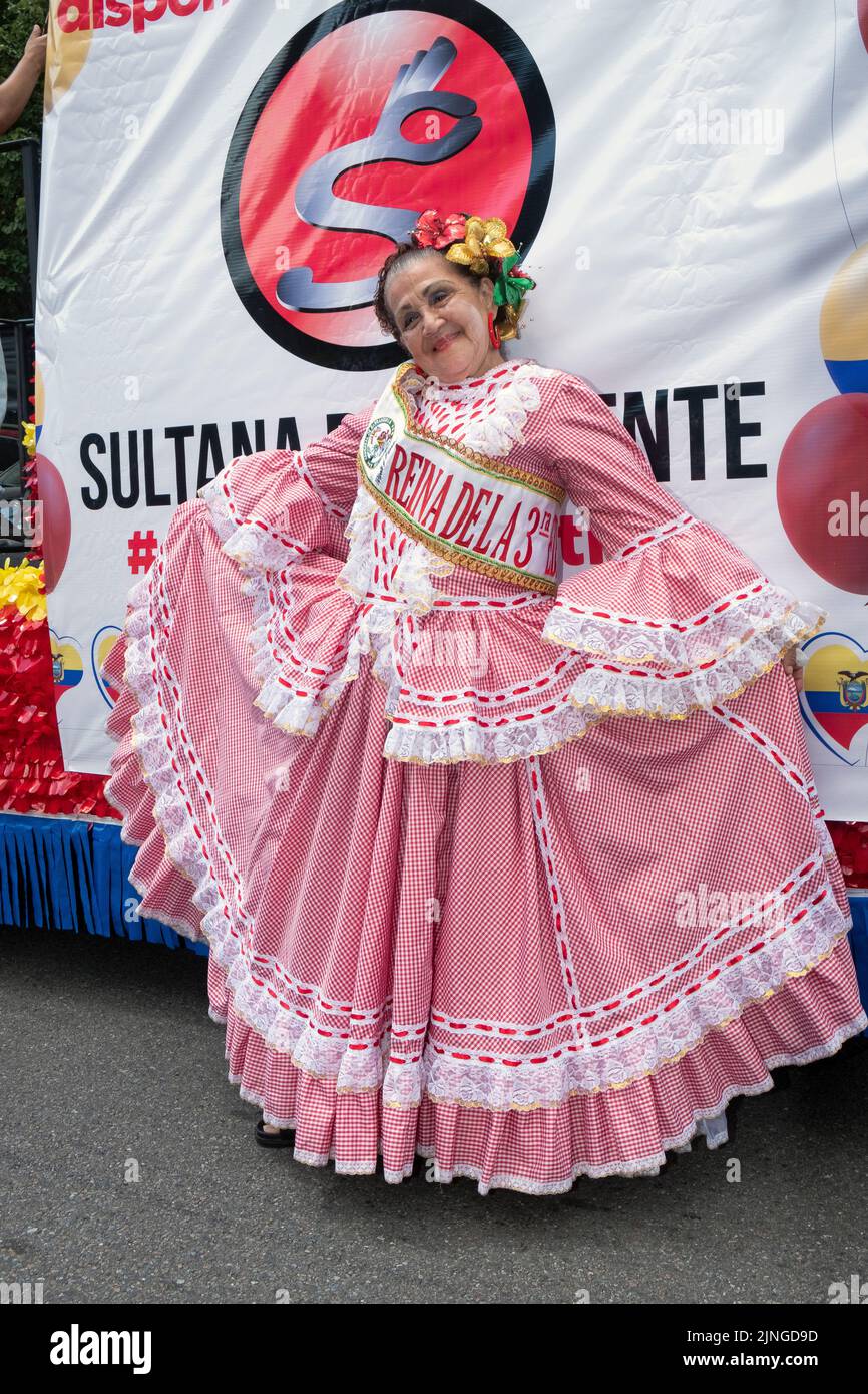 A senior beauty queen wearing a sash from Carnaval de Barranquilla.  At the Ecuadorian Parade NYC 2022 in Jackson Heights, Queens, New York. Stock Photo