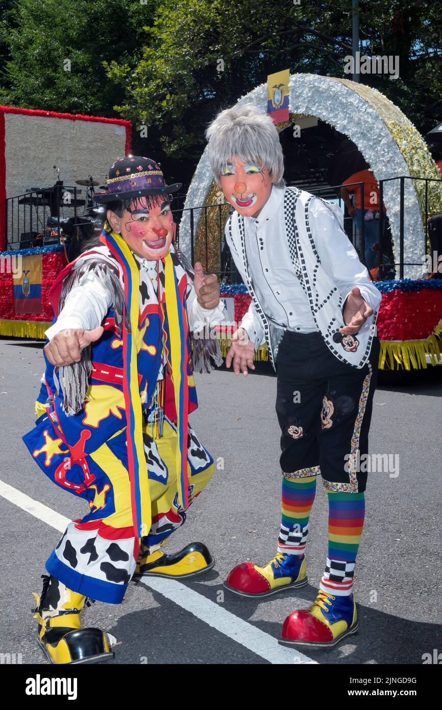 Ecuadorian American clowns in costume pose for a photo at the Ecuadorian Parade NYC 2022 in Jackson Heights, Queens, New York City. Stock Photo