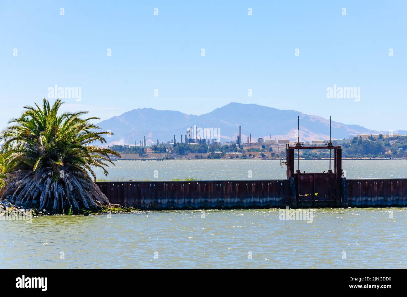 A view across the water from Benicia Marin looking towards The Shell Martinez Refinery in California, USA Stock Photo