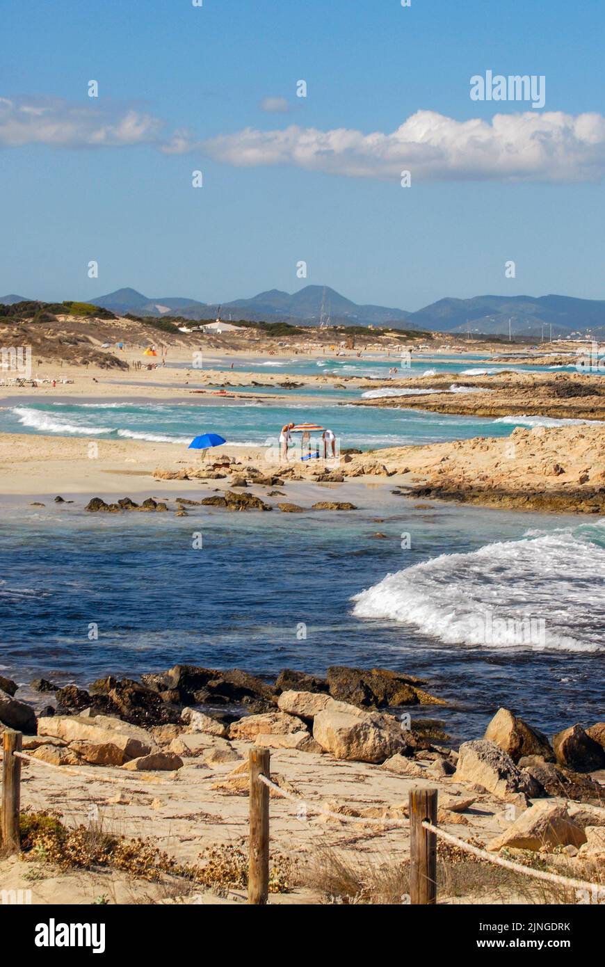 Strong sea and yellow flag in Levante beach - Playa de Llevant -, Formentera Stock Photo