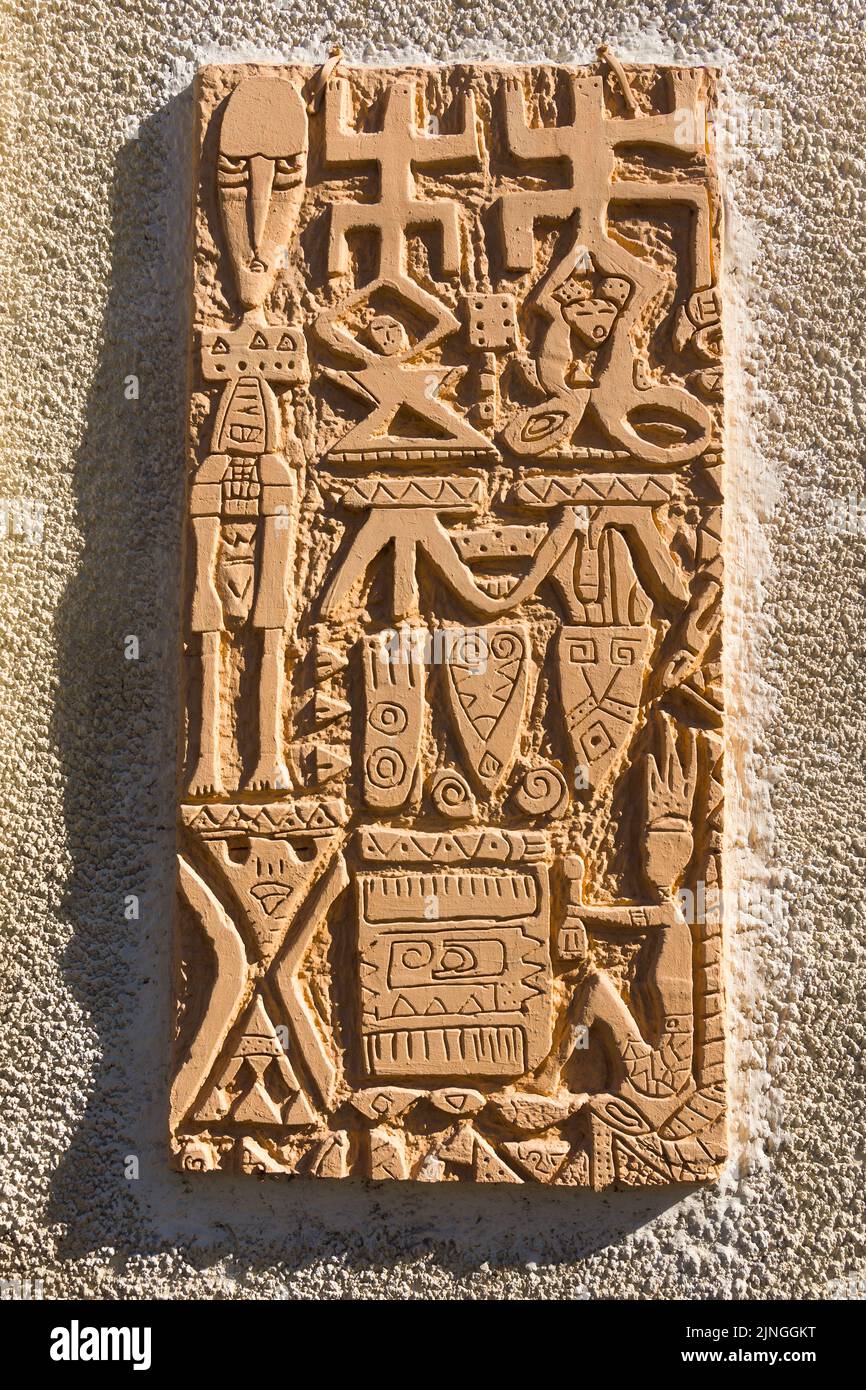 Fired clay plaque outside art studio in Le-Pont-Chretien-Chabenet, Indre (36), France. Stock Photo