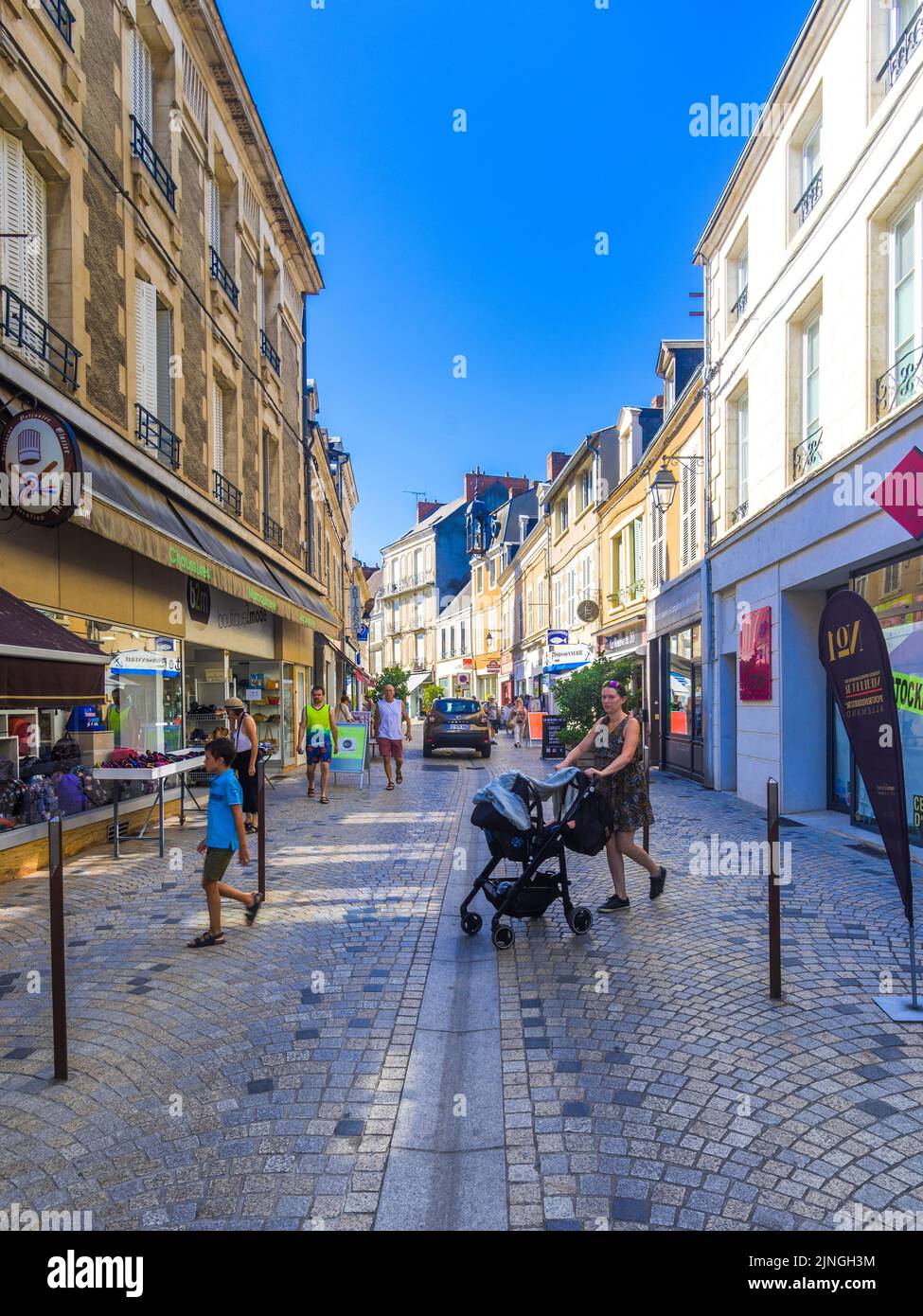 Shoppers on the Grande Rue, Argenton-sur-Creuse, Indre (36), France. Stock Photo