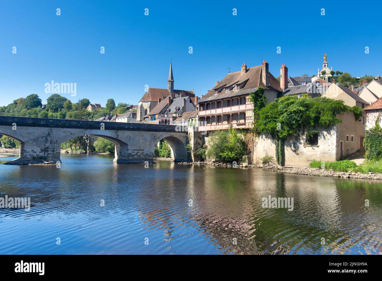 Arched stone bridge across the river Creuse in Argenton-sur-Creuse, Indre (36), France. Stock Photo