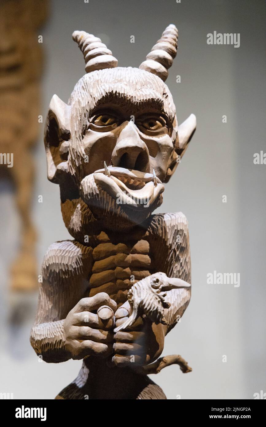 The Devils Museum, Kaunas Lithuania; close up of wood carving of the Devil, or Satan, in the museums interior, Lithuania, Baltic States, Europe Stock Photo