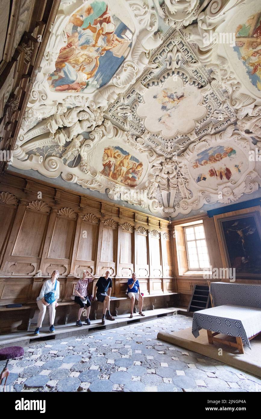 Lithuania tourist; a group of tourists looking at the painted ceilings, interior of Pazaislis Monastery, Kaunas, Lithuania Europe Stock Photo