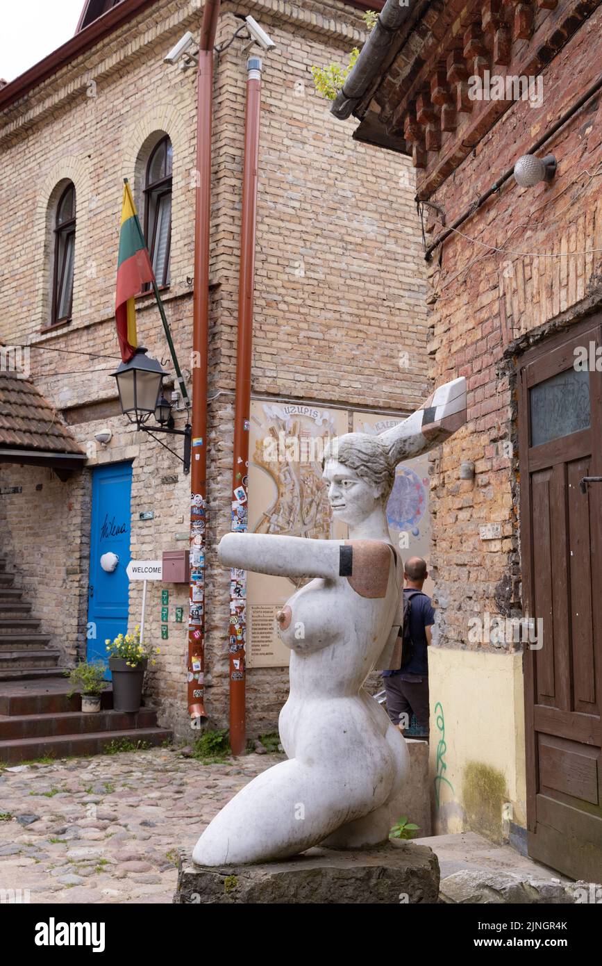 Lithuania travel; Uzupis Vilnius; street art and a statue in the republic of Uzupis, Vilnius, Lithuania Europe Stock Photo