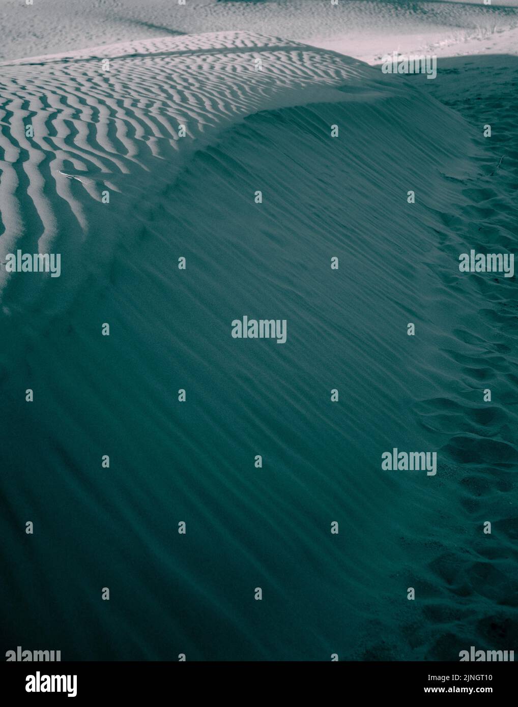 Ripples in sand dunes, abstract background Stock Photo