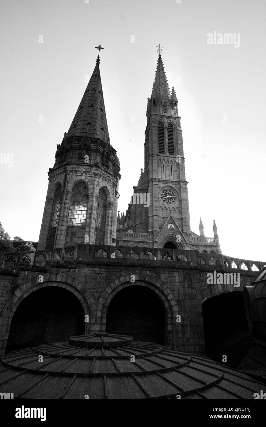 Sanctuaires Notre-Dame de Lourdes, a Catholic pilgrimage site in the South of France. The Sanctuary of Our Lady of Lourdes. Church. Cathedral. Shrine. Stock Photo