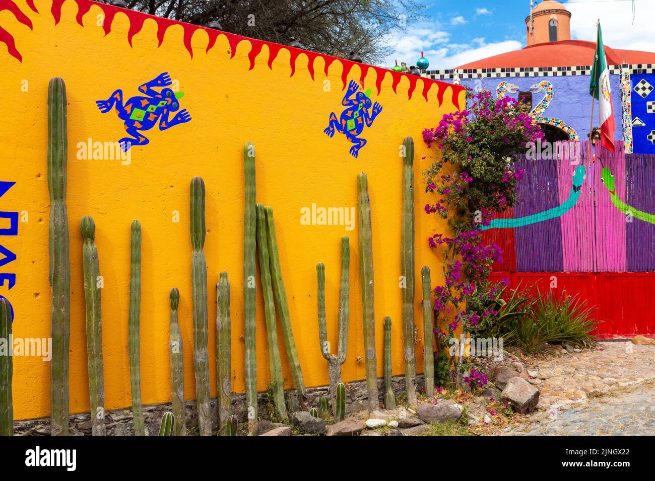 The colorful facade of American artist Anado McLauchlin home and studio called the Chapel of Jimmy Ray in his art compound Casa las Ranas in La Cieneguita, Mexico. Stock Photo