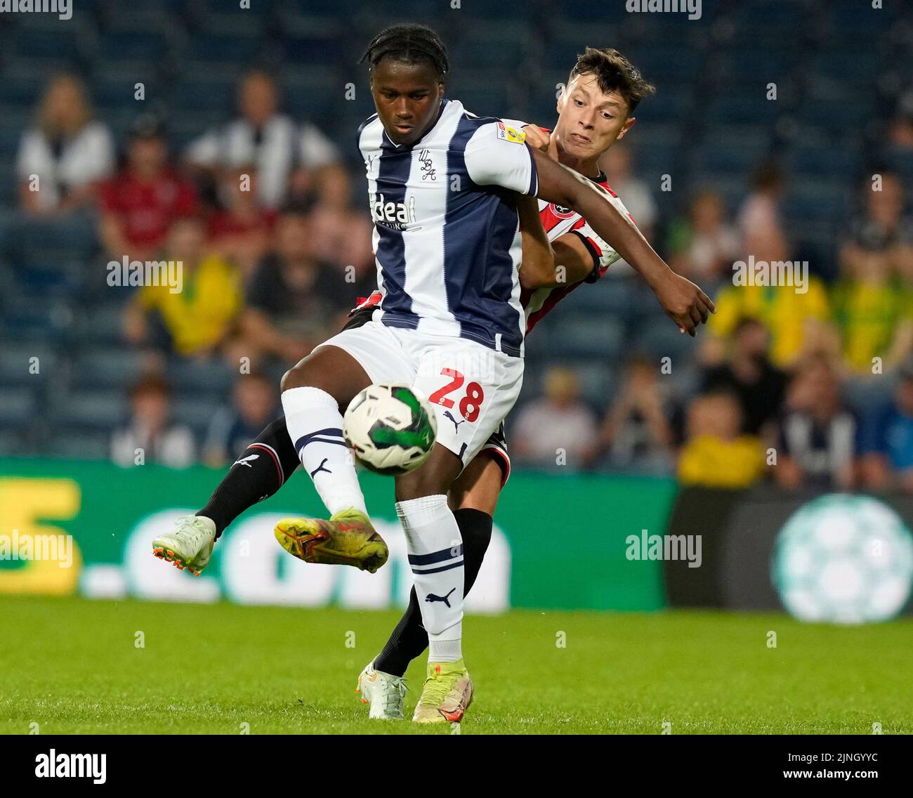 West Bromwich, England, 11th August 2022.   Reyes Cleary of West Bromwich Albion tackled by Anel Ahmedhodzic of Sheffield Utd during the Carabao Cup match at The Hawthorns, West Bromwich. Picture credit should read: Andrew Yates / Sportimage Stock Photo
