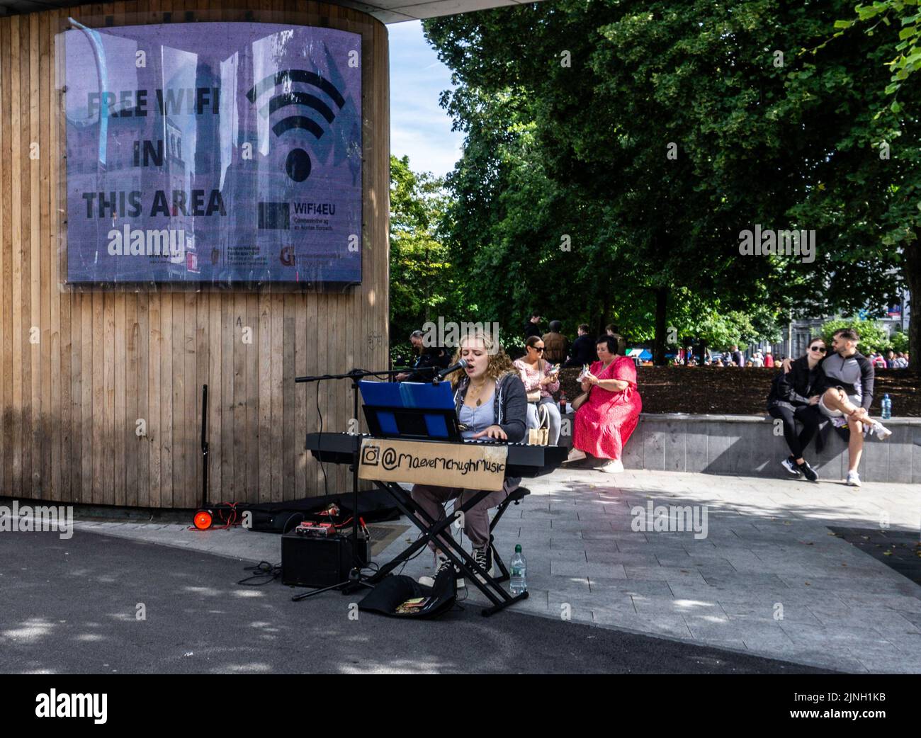 Maeve McHugh busking in Eyre Square.Singer and piano player. Stock Photo